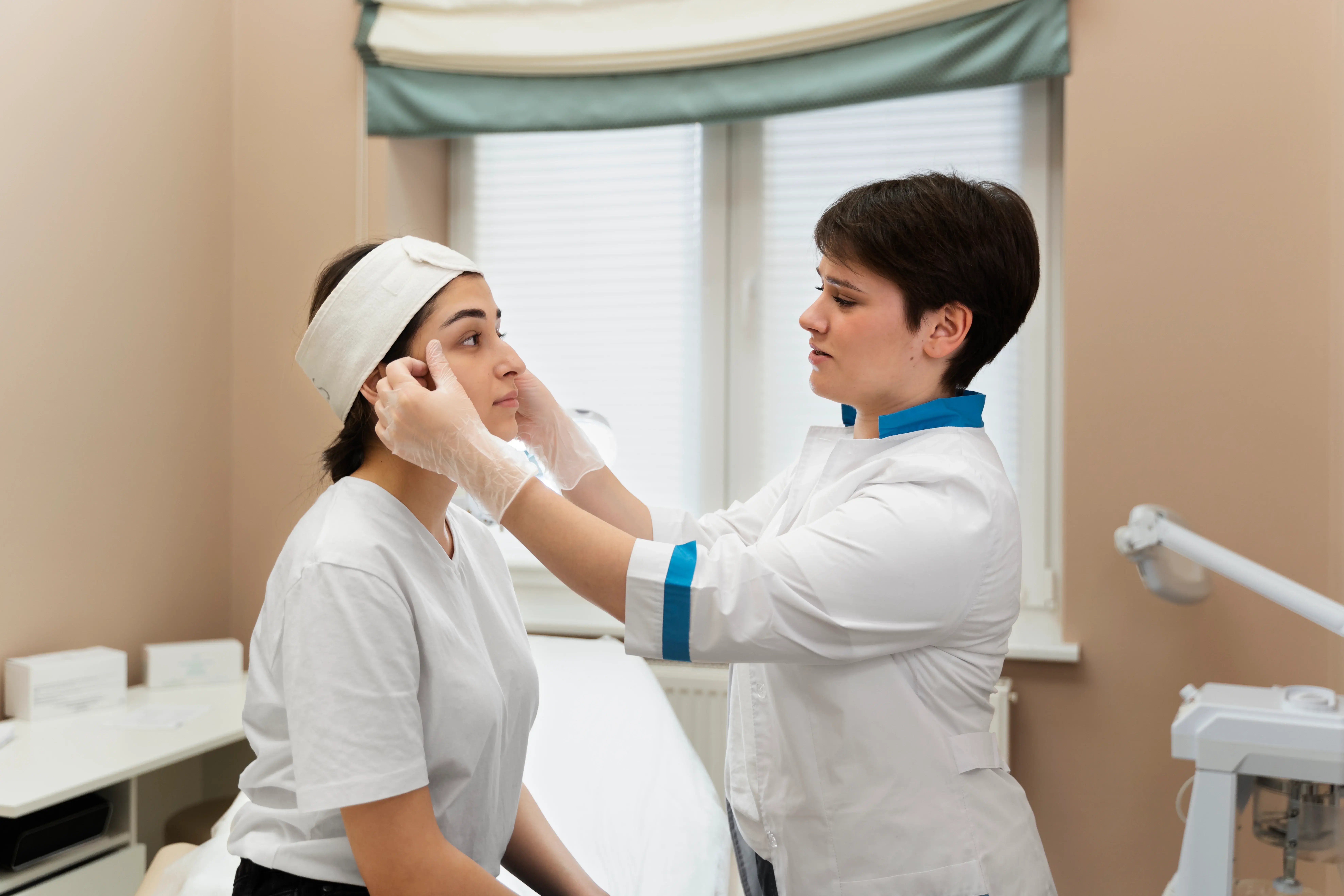 client getting assessed for aesthetic treatment options