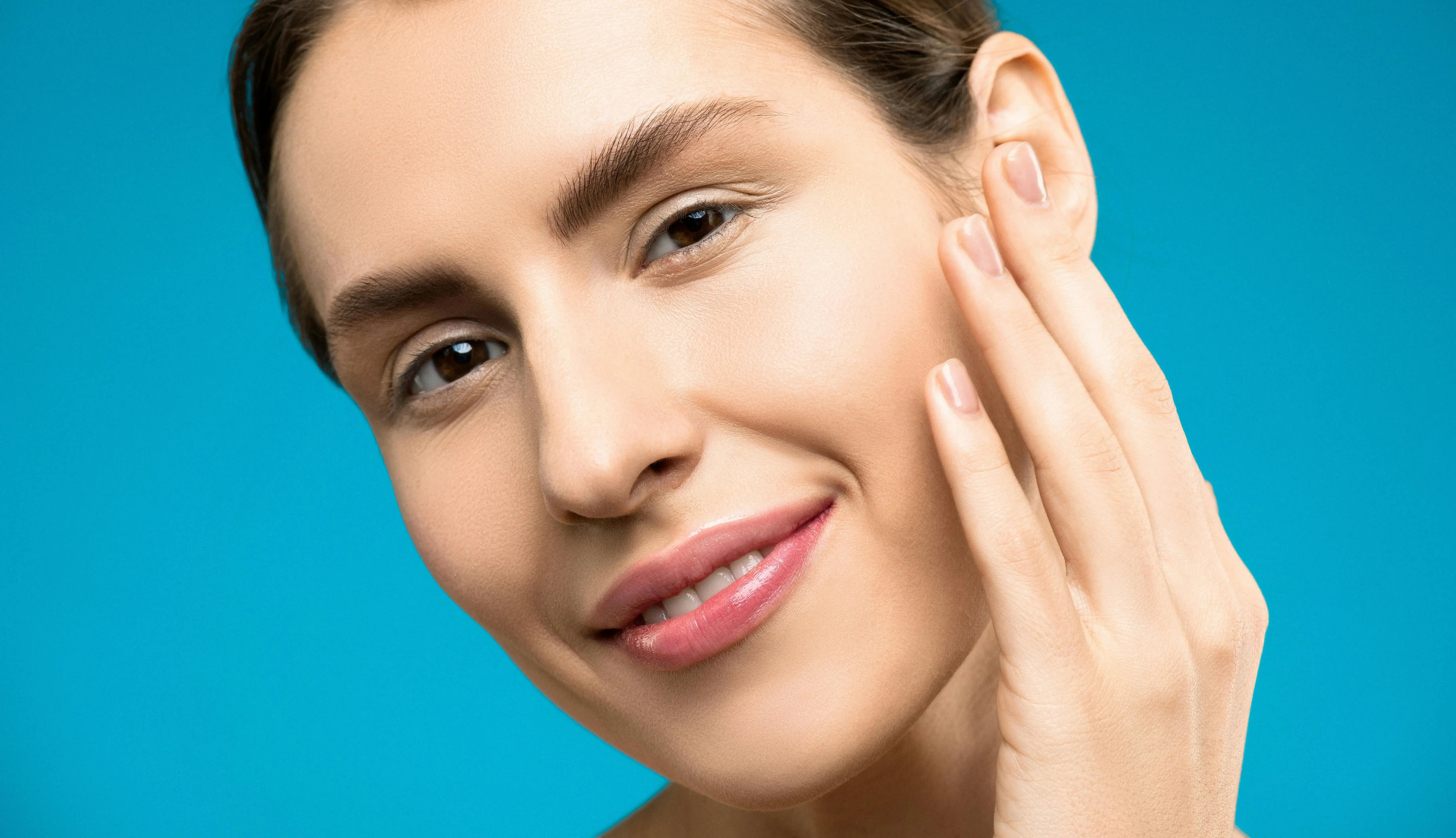 close up of women smiling after marionette line dermal filler treatment
