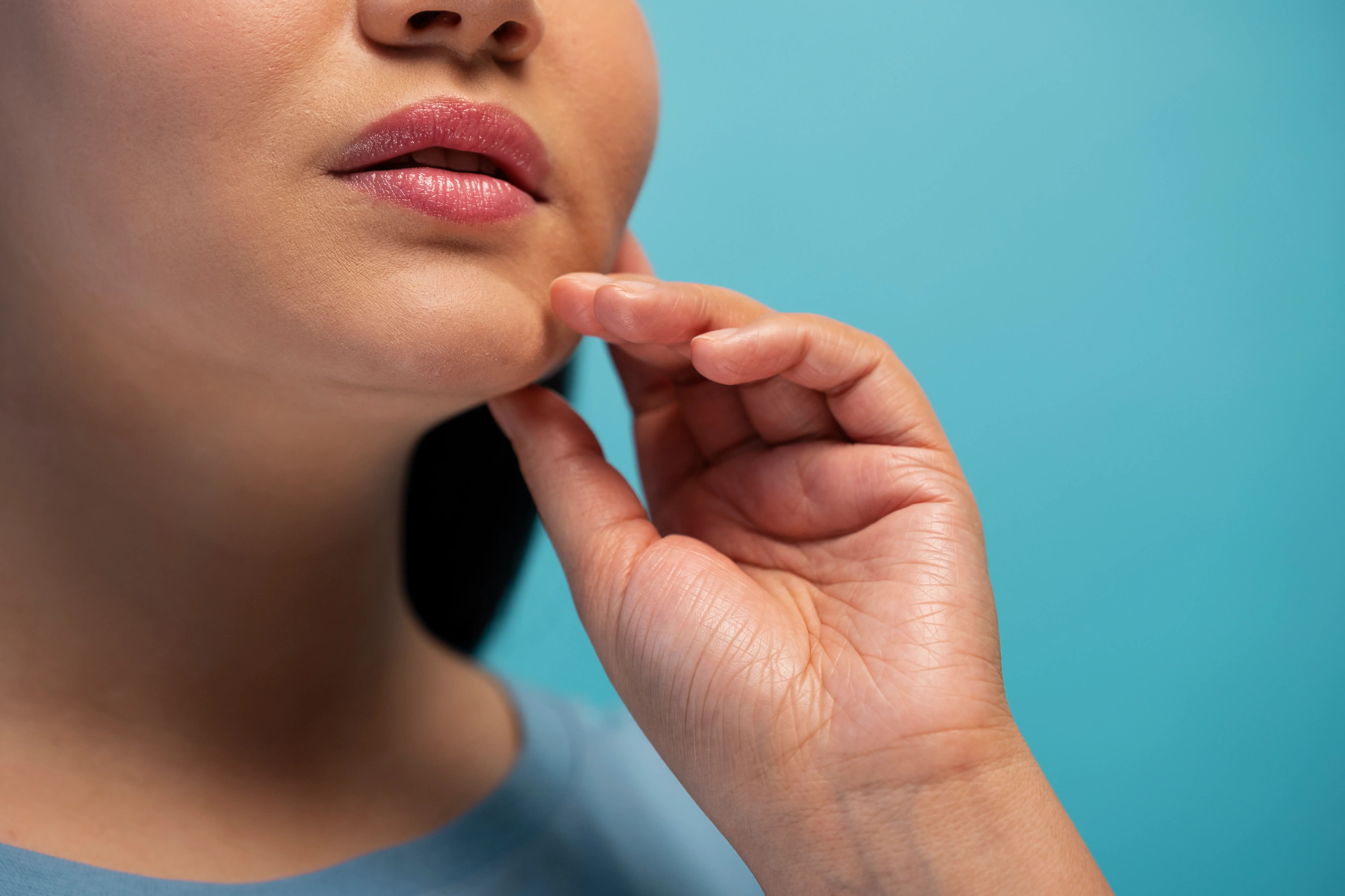 close up of womens double chin removal treatment process