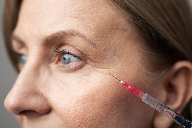 woman with injectables for under eyes​