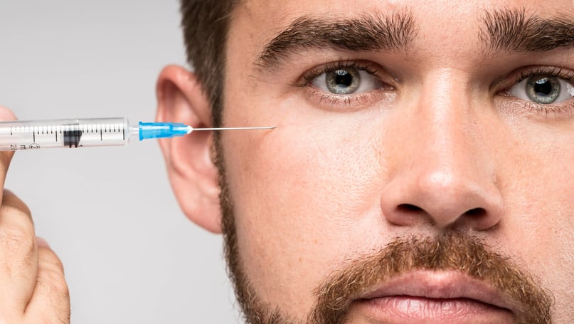 man with injectables for under eyes​