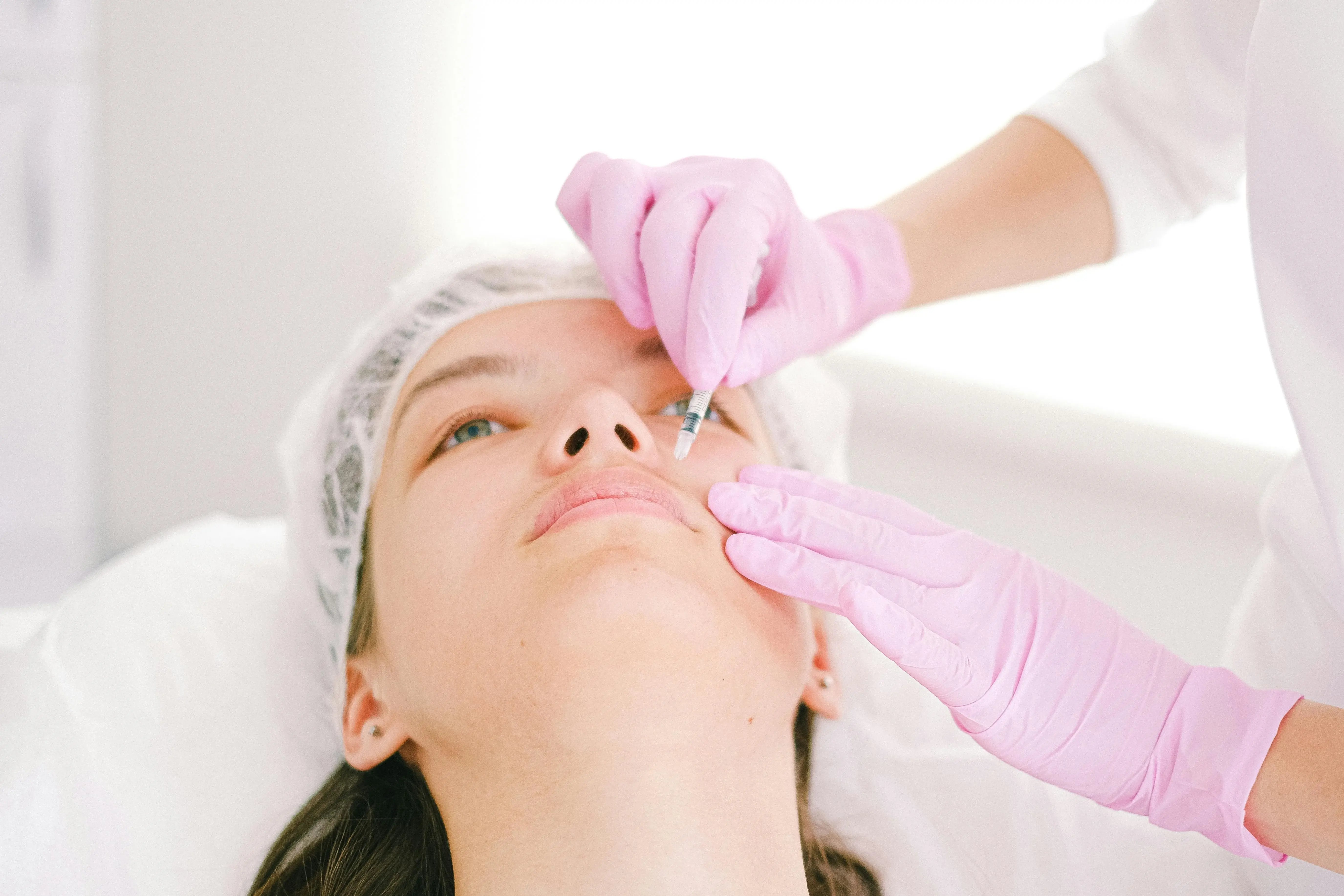 women getting injected with neuromodulators